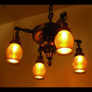 Early 1900s Brass Four Arm Chandelier with signed Steuben Shade
